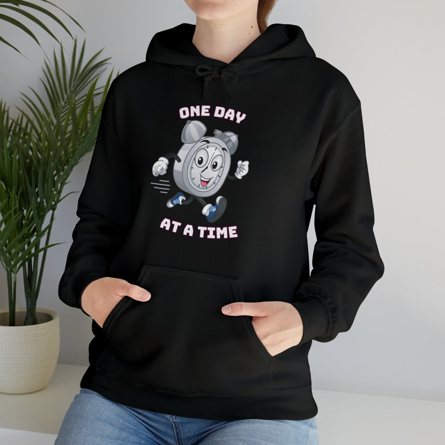 Trendy One Day At a Time hoodie with clean typography design